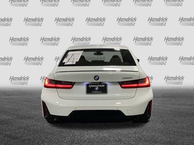 new 2025 BMW 330 car, priced at $55,880