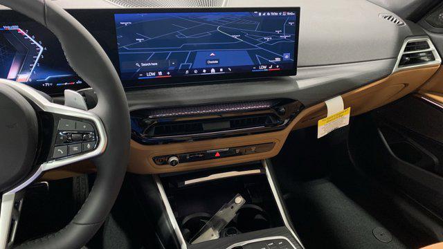 new 2025 BMW 330 car, priced at $55,880