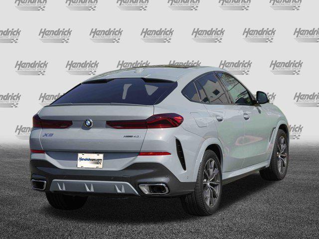 used 2025 BMW X6 car, priced at $76,991