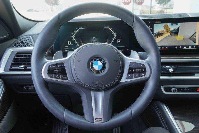 used 2025 BMW X6 car, priced at $76,991