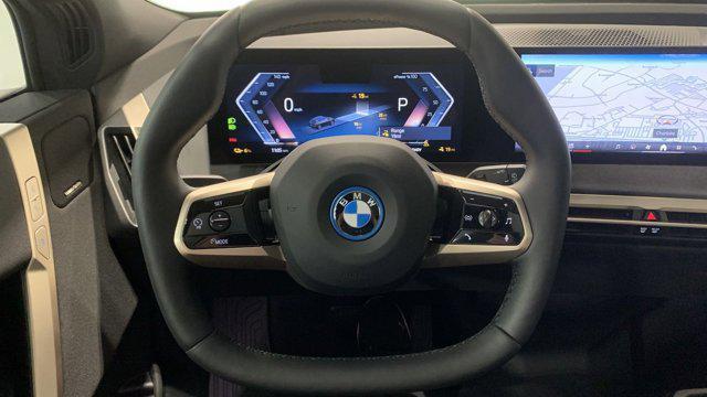 new 2025 BMW iX car, priced at $92,345