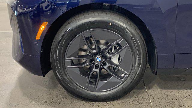 new 2026 BMW iX car, priced at $97,870