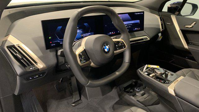 new 2026 BMW iX car, priced at $97,870