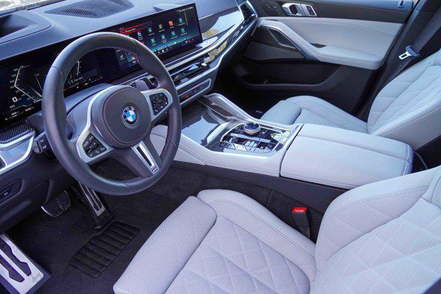 used 2025 BMW X6 car, priced at $89,319