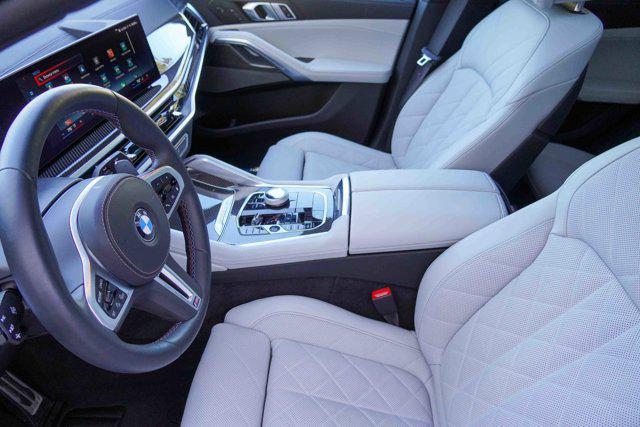 used 2025 BMW X6 car, priced at $89,319