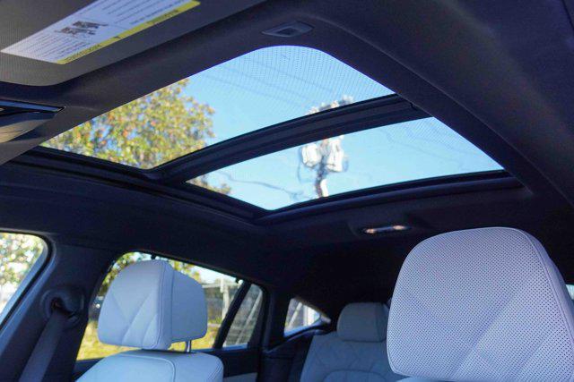 used 2025 BMW X6 car, priced at $89,319