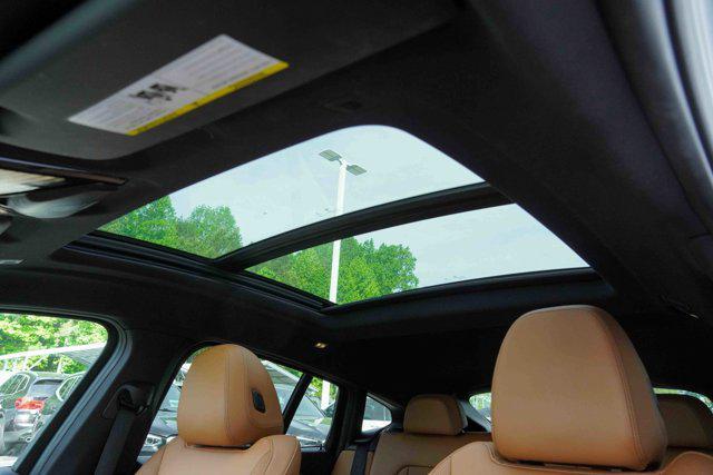 used 2023 BMW X4 car, priced at $45,991