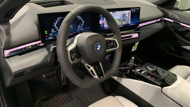 new 2026 BMW 550e car, priced at $83,415