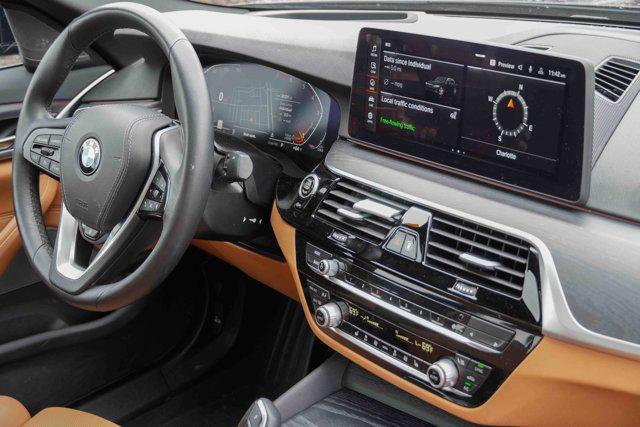 used 2023 BMW 530 car, priced at $38,991