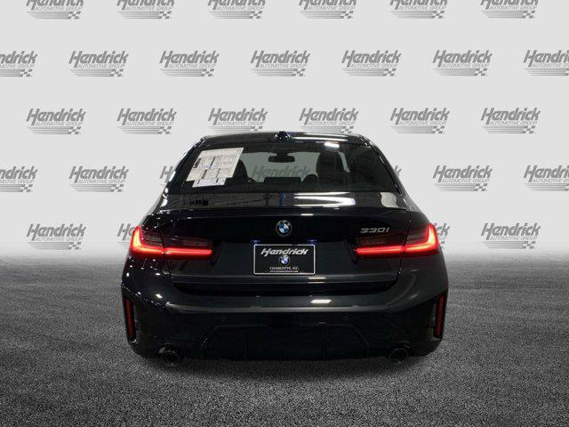 new 2025 BMW 330 car, priced at $53,130