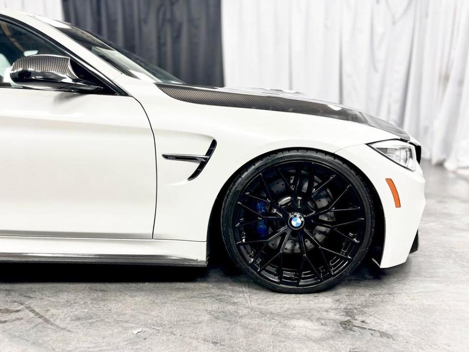 used 2015 BMW M4 car, priced at $39,950