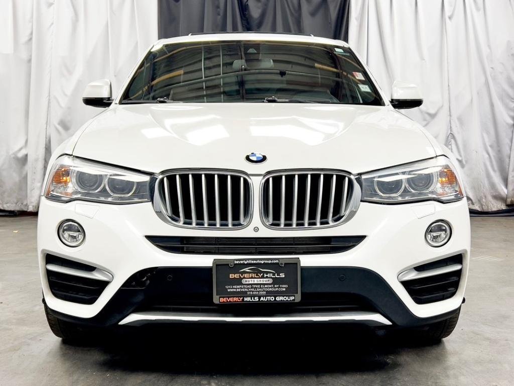 used 2018 BMW X4 car, priced at $17,950