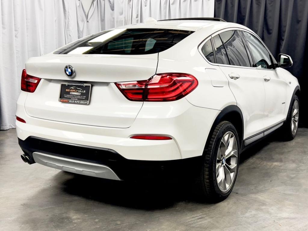 used 2018 BMW X4 car, priced at $17,950