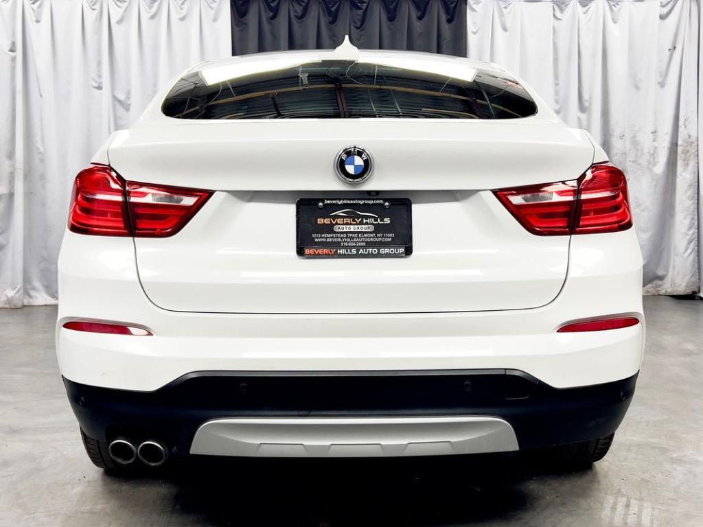 used 2018 BMW X4 car, priced at $17,950