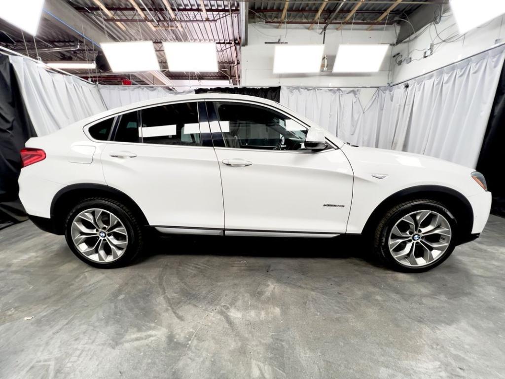 used 2018 BMW X4 car, priced at $17,950