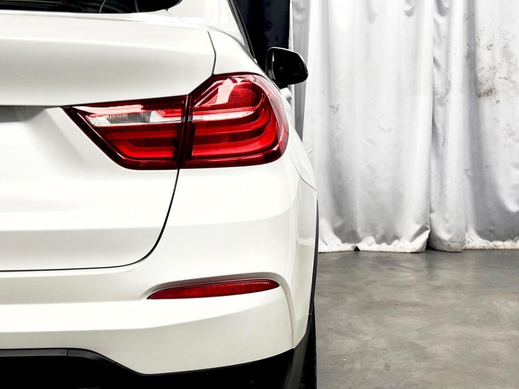 used 2018 BMW X4 car, priced at $17,950