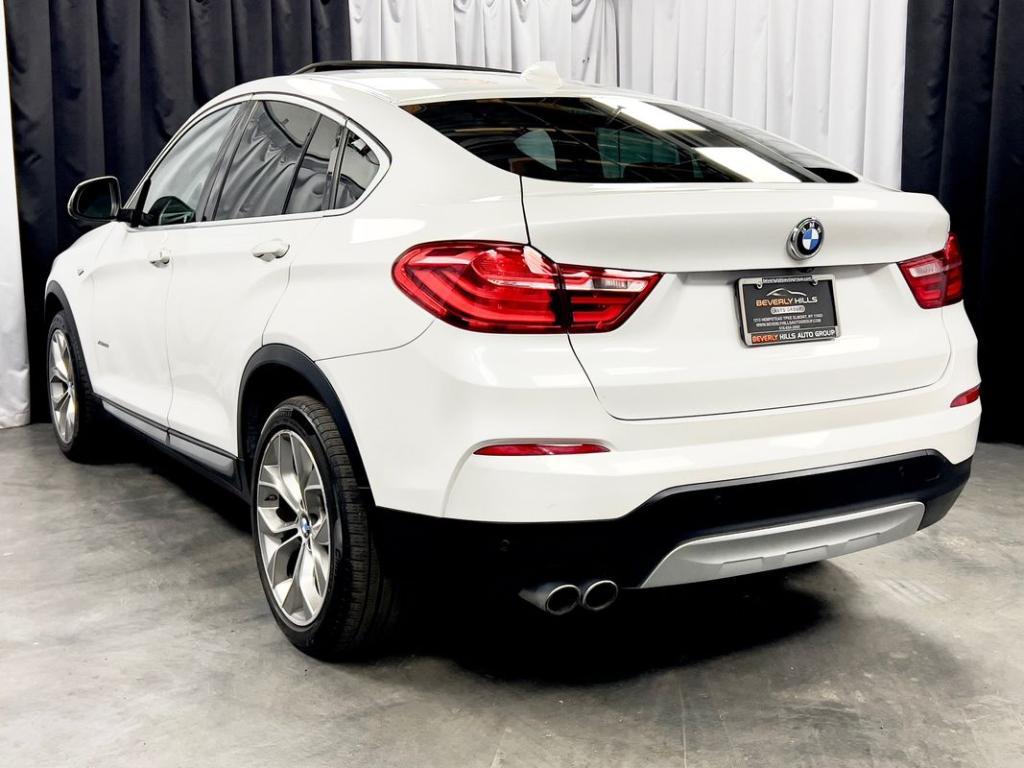 used 2018 BMW X4 car, priced at $17,950