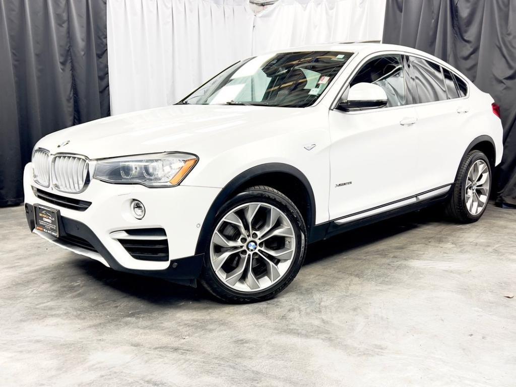 used 2018 BMW X4 car, priced at $17,950