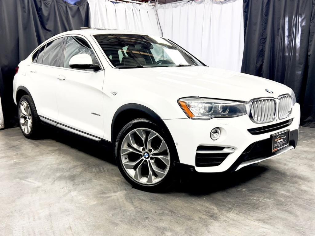 used 2018 BMW X4 car, priced at $17,950