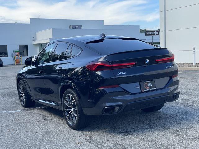 used 2023 BMW X6 car, priced at $58,975