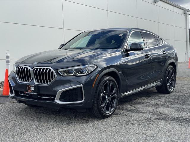 used 2022 BMW X6 car, priced at $57,784