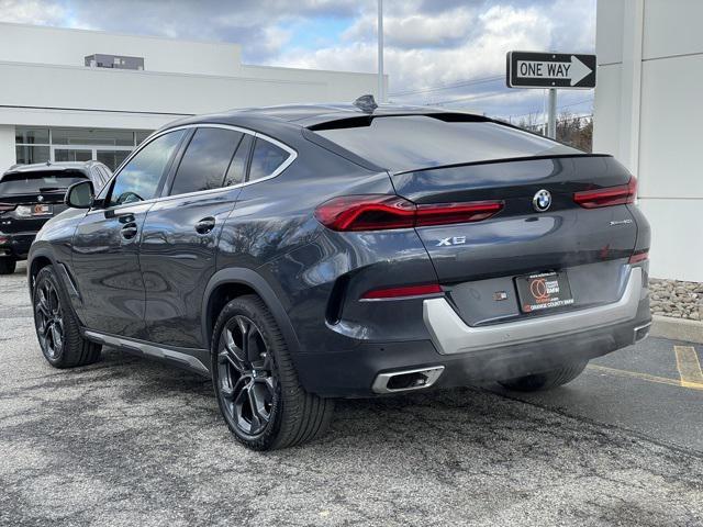 used 2022 BMW X6 car, priced at $57,784