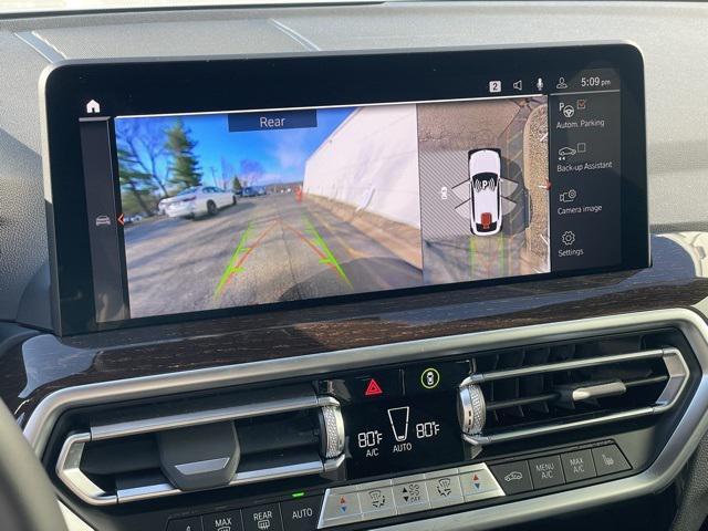 used 2025 BMW X4 car, priced at $58,995