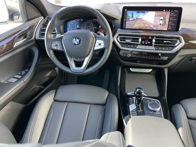 used 2025 BMW X4 car, priced at $58,995