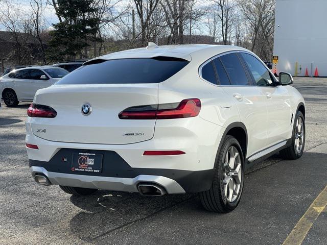 used 2025 BMW X4 car, priced at $58,995