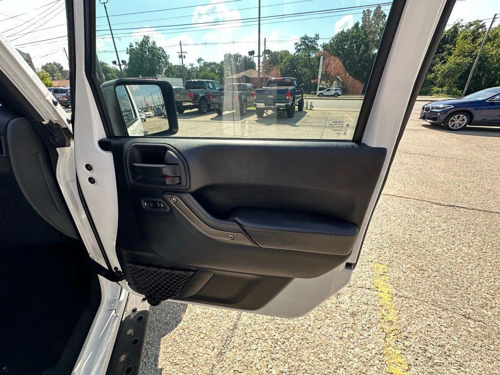 used 2018 Jeep Wrangler JK Unlimited car, priced at $23,995