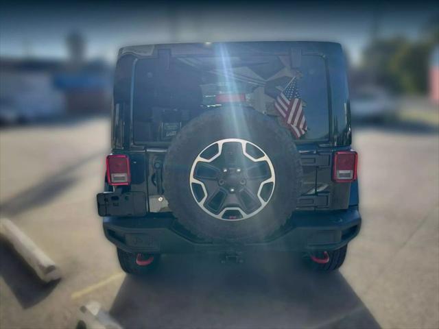 used 2016 Jeep Wrangler Unlimited car, priced at $17,895