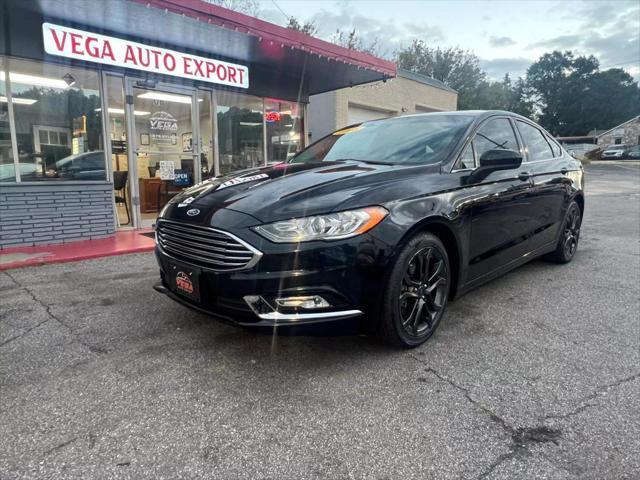 used 2018 Ford Fusion car, priced at $10,999