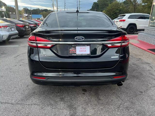 used 2018 Ford Fusion car, priced at $10,999