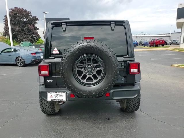 used 2022 Jeep Wrangler Unlimited car, priced at $38,833