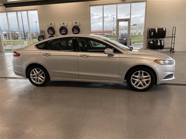 used 2014 Ford Fusion car, priced at $6,887