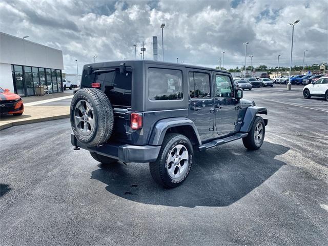 used 2018 Jeep Wrangler JK Unlimited car, priced at $23,995