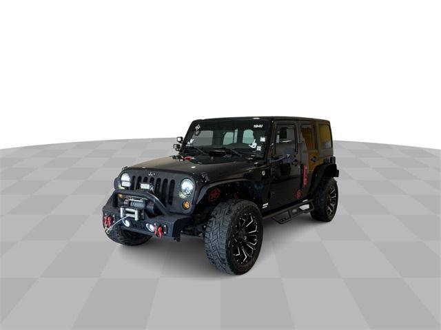 used 2012 Jeep Wrangler Unlimited car, priced at $16,355