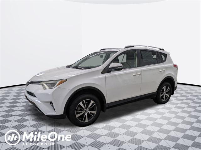 used 2018 Toyota RAV4 car, priced at $14,000