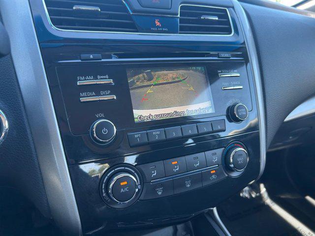 used 2015 Nissan Altima car, priced at $9,999