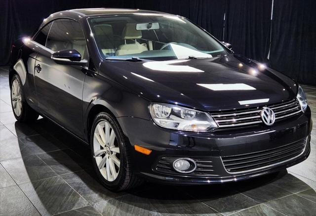 used 2014 Volkswagen Eos car, priced at $15,900