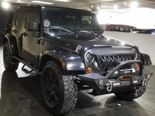 used 2011 Jeep Wrangler Unlimited car, priced at $16,900