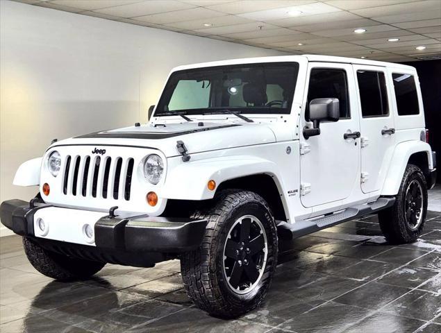 used 2012 Jeep Wrangler Unlimited car, priced at $19,900