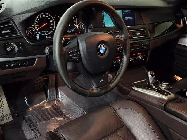 used 2013 BMW M5 car, priced at $31,900