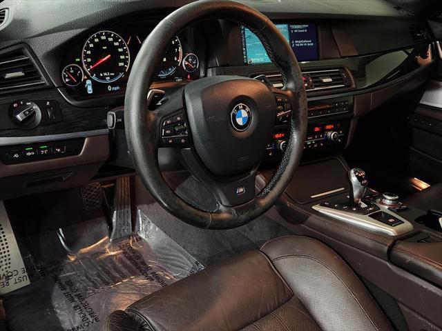 used 2013 BMW M5 car, priced at $29,900