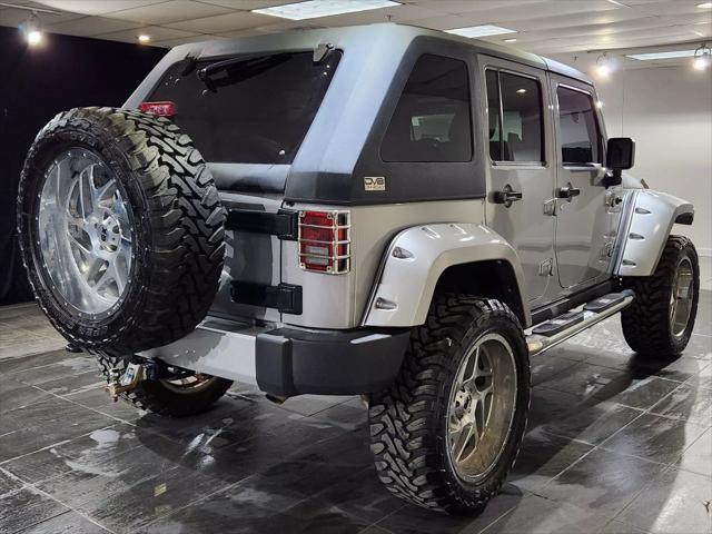 used 2015 Jeep Wrangler Unlimited car, priced at $27,900