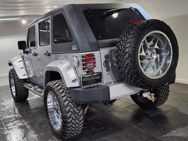 used 2015 Jeep Wrangler Unlimited car, priced at $27,900