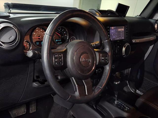 used 2015 Jeep Wrangler Unlimited car, priced at $27,900