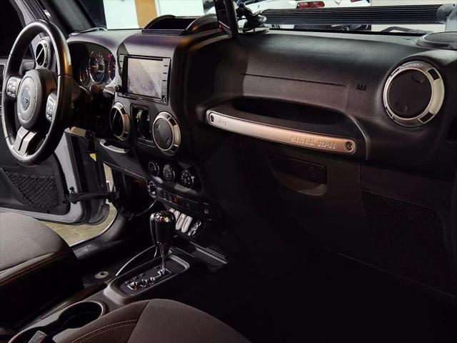 used 2015 Jeep Wrangler Unlimited car, priced at $27,900