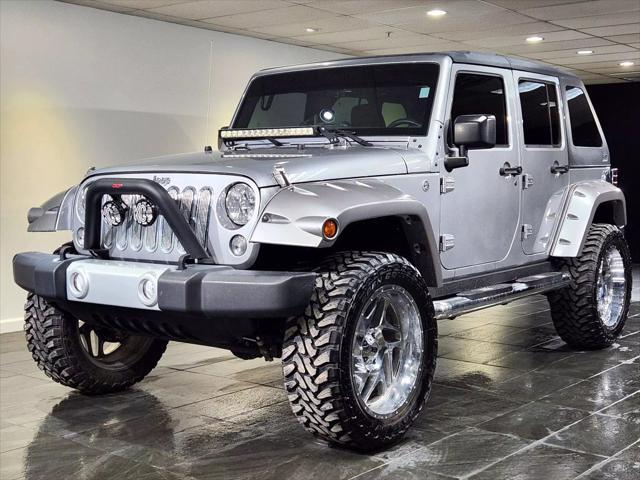 used 2015 Jeep Wrangler Unlimited car, priced at $27,900