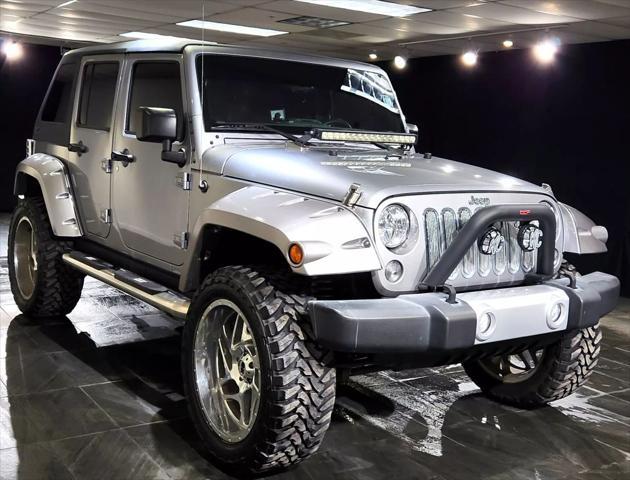 used 2015 Jeep Wrangler Unlimited car, priced at $27,900